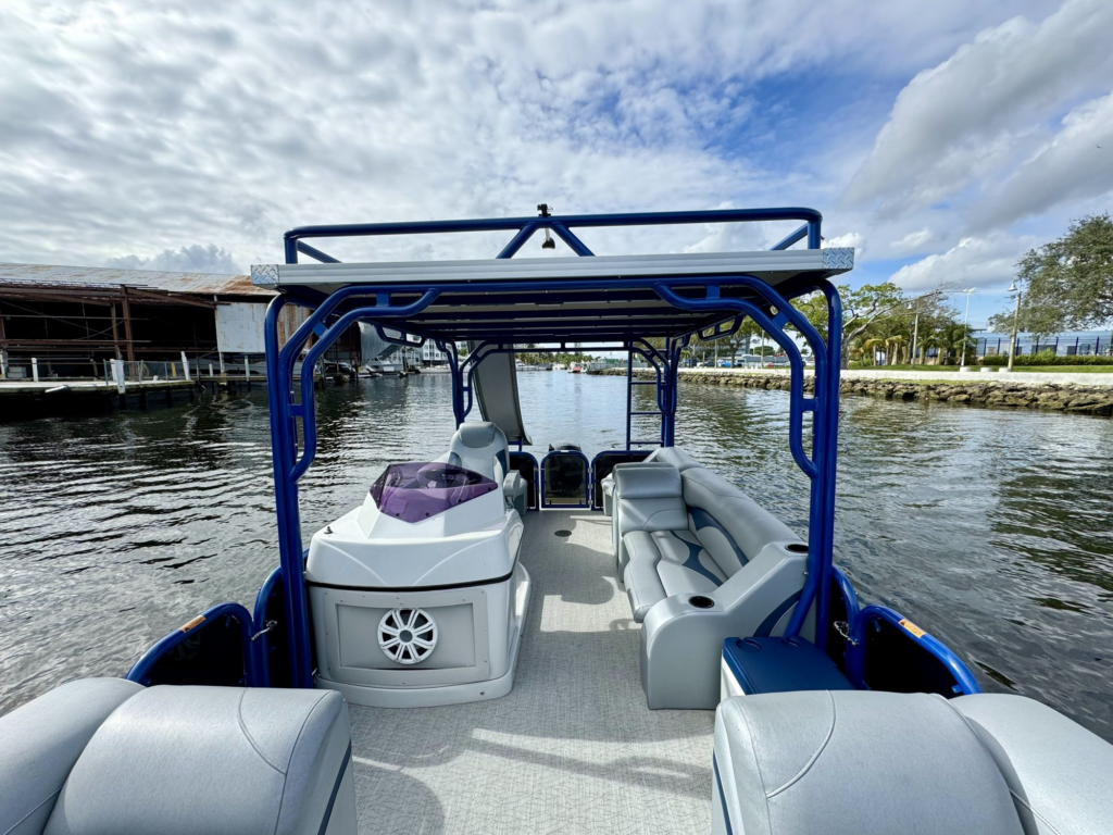 30ft pontoon boat charter Coconut Grove – bimini top and helm