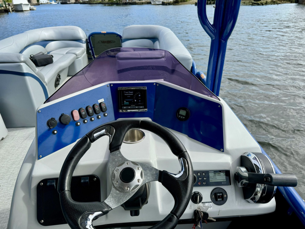 30ft pontoon boat charter Coconut Grove – helm