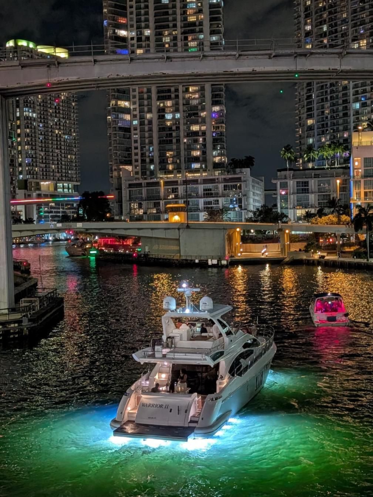 70ft Azimut Flybridge yacht charter Miami Beach – night exterior