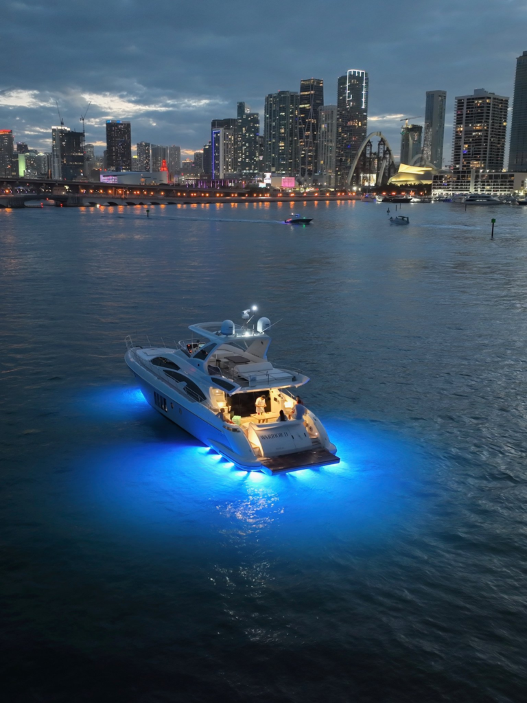70ft Azimut Flybridge yacht charter Miami Beach – night underwater lights