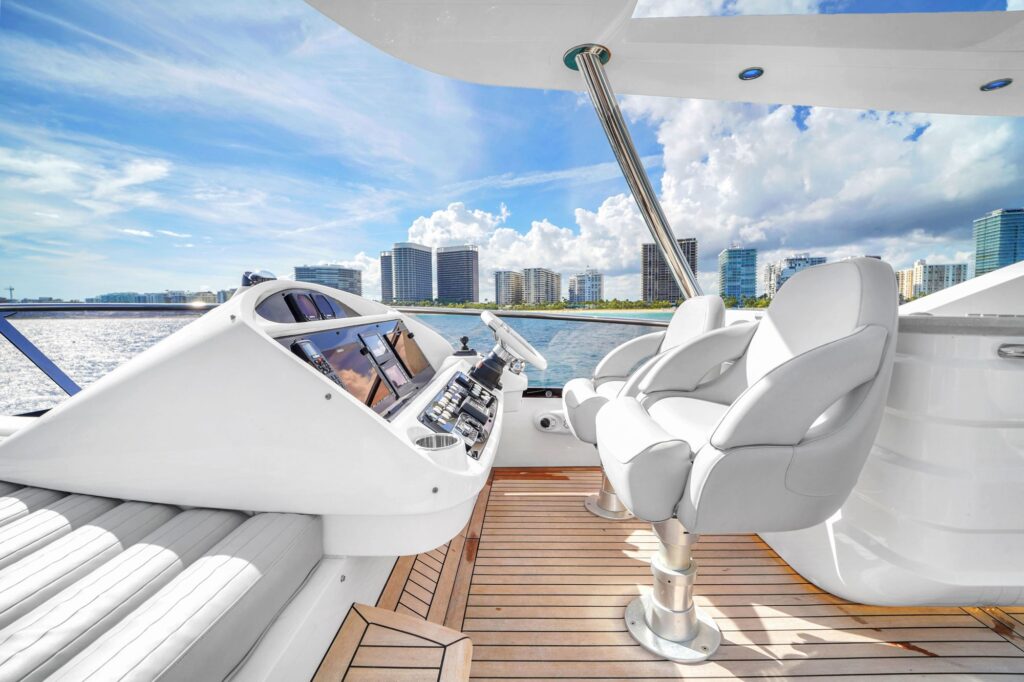 75ft Sunseeker yacht charter Marina Palms – flybridge helm