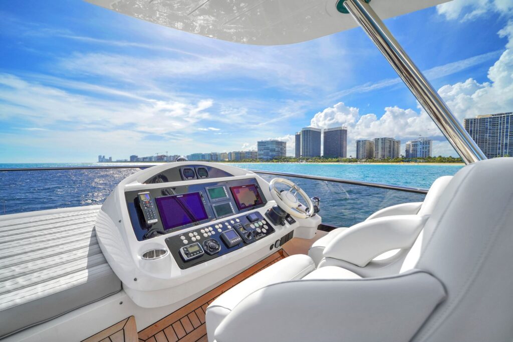 75ft Sunseeker yacht charter Marina Palms – flybridge helm