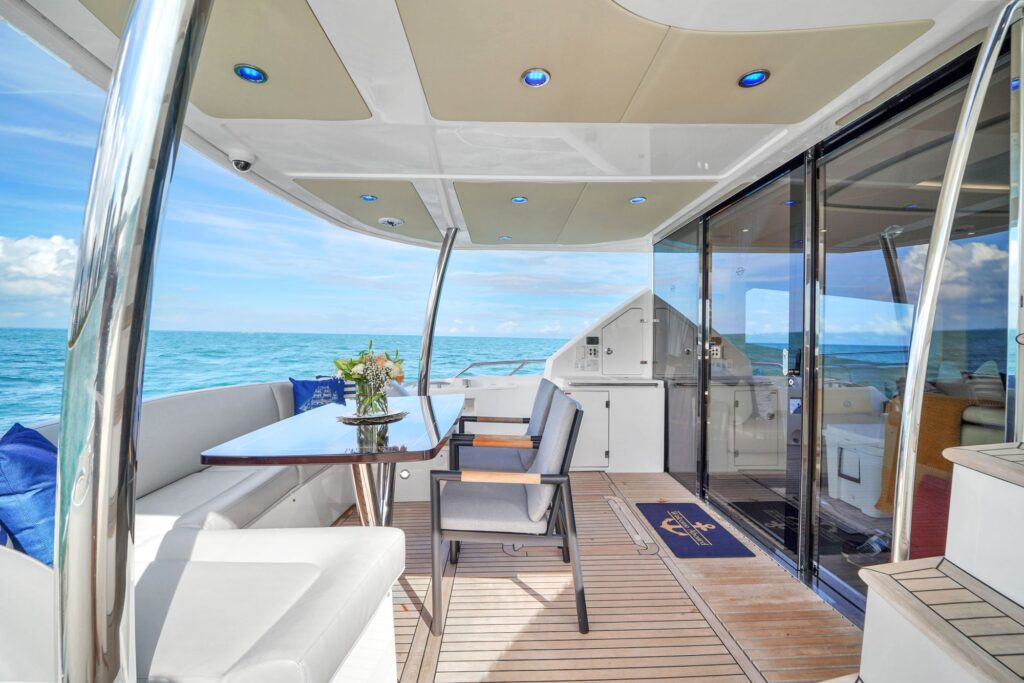 75ft Sunseeker yacht charter Marina Palms – aft cockpit dining