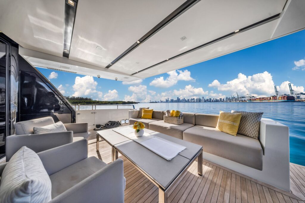 97ft Sanlorenzo yacht charter Miami – flybridge dining under the hardtop